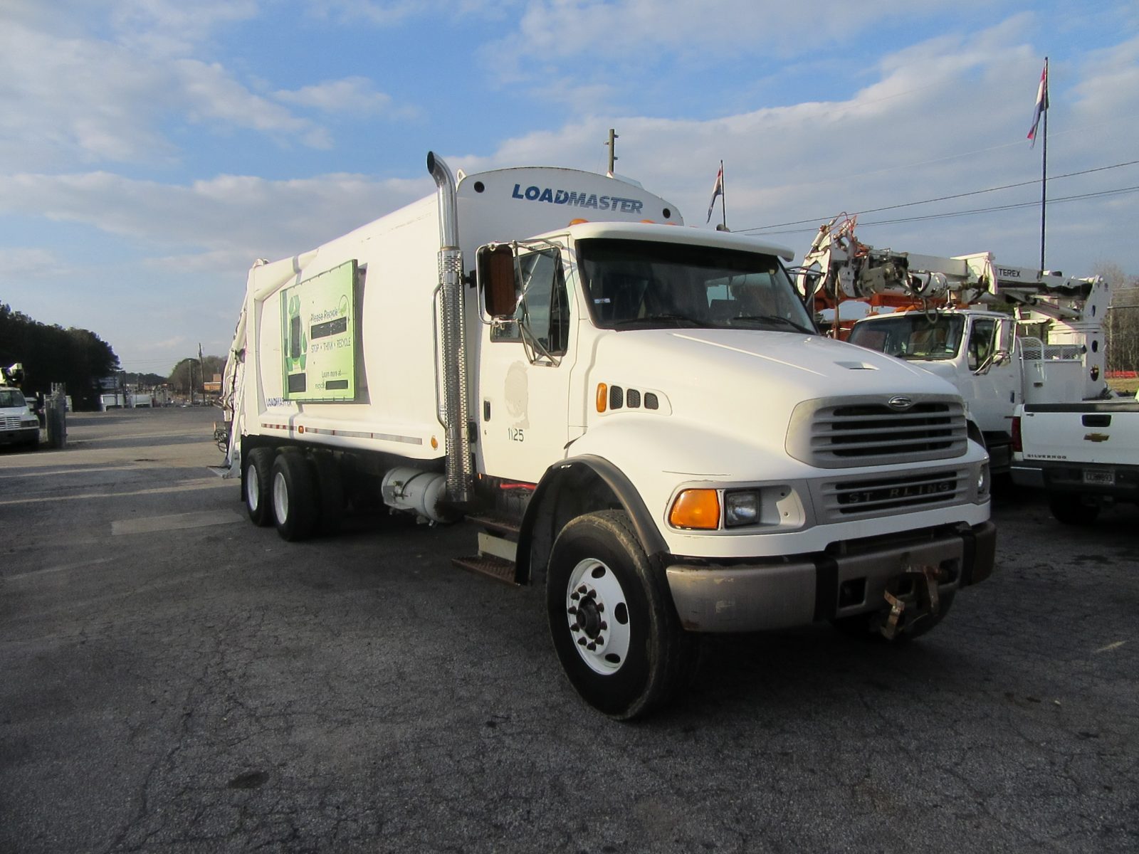 Click for price on this 2006 Sterling Acterra 31 yd Rear Loader Garbage Truck